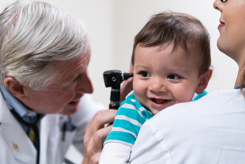 Doctor treating infant